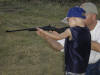 Rance teaching his son Bryce at 5 years old to shoot his first gun a .22 Cricket.