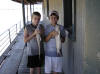 Riley and his friend Bryce Mills with a couple catfish from a North Texas lake.
